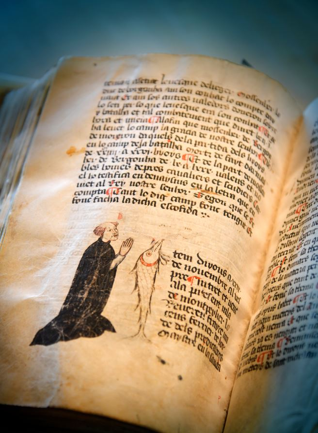 Page du Petit Thalamus illustré d'une enluminure représentant le dominicain Saint Vincent Ferrier